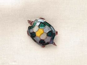 Enameled Brooches